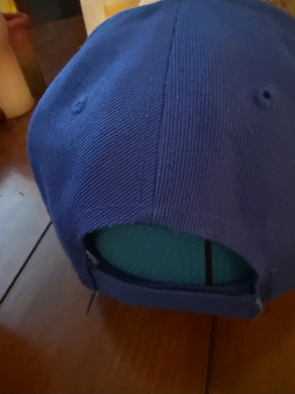 Blue Cap with White Embroidered Script 'E'